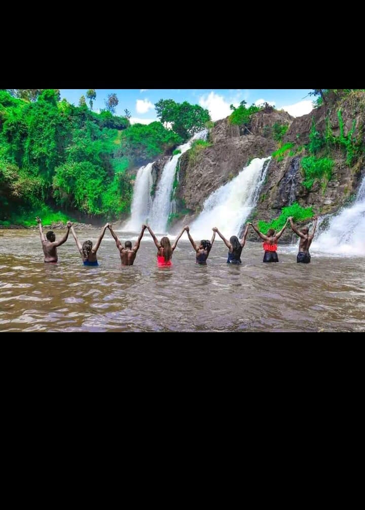 Sunrise mist rising over Thiba Falls